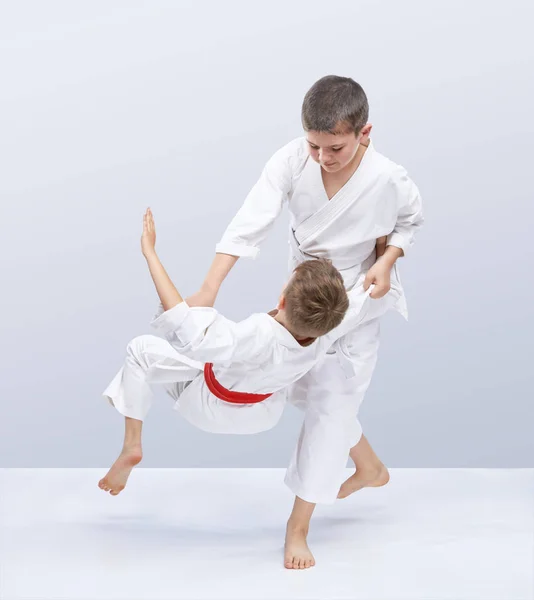 depositphotos_193268870-stock-photo-children-are-training-judo-throws